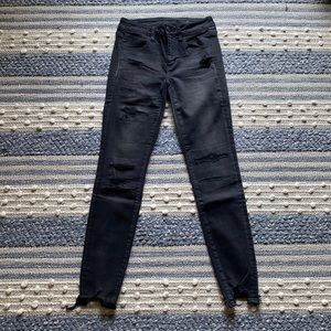 Black distressed skinny jeans